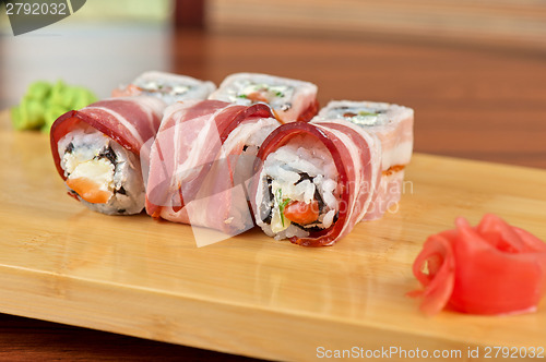 Image of Sushi roll with bacon