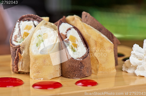 Image of pancake roll with marmalade