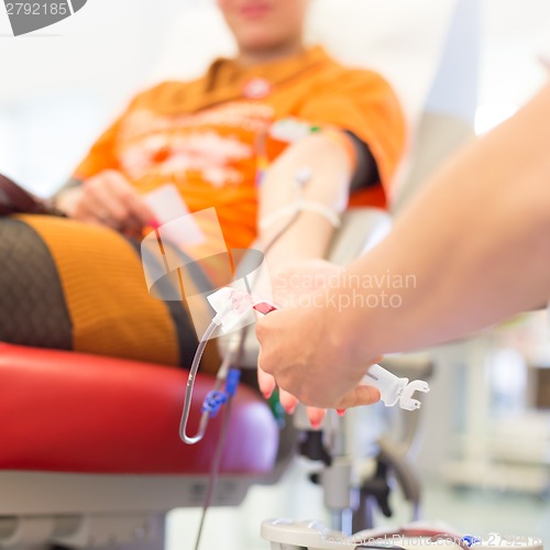 Image of Nurse and blood donor at donation.