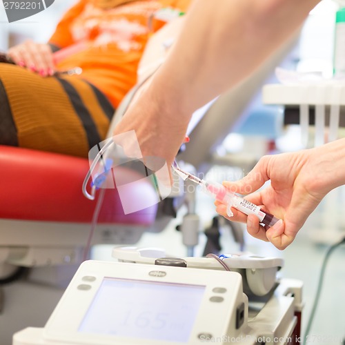 Image of Nurse and blood donor at donation.