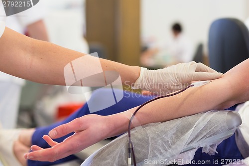 Image of Nurse and blood donor at donation.