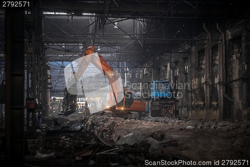 Image of Industrial interior with bulldozer inside