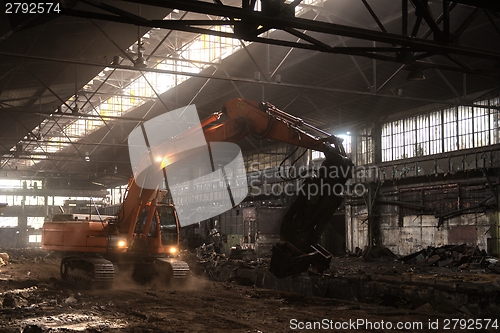 Image of Industrial interior with bulldozer inside