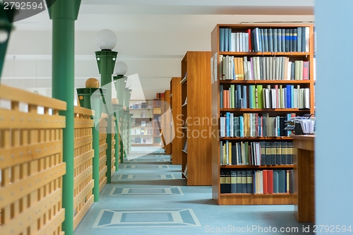 Image of Library bookshelf closeup with letter