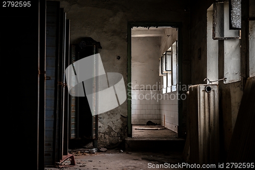 Image of Dark room with steel lockers