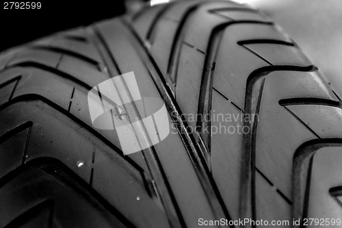 Image of New car tyre closeup photo