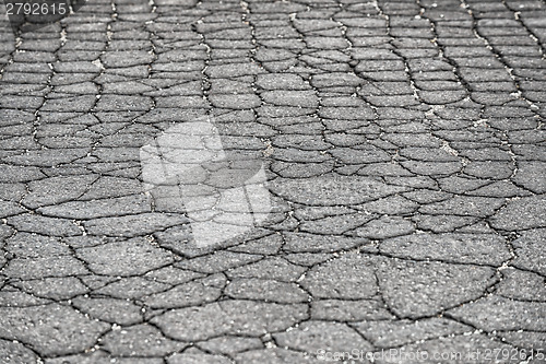 Image of Damaged car road with a lot of cracks