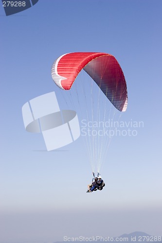 Image of Red paraglider with two person