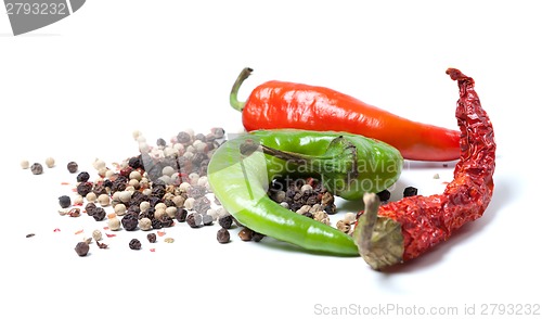 Image of Mix of hot peppers on white background