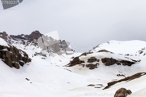 Image of Snow mountains at cloudy day