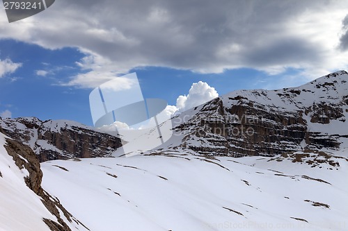 Image of Snow rocks and cloudy sky