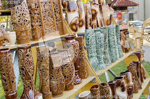 Image of clay vase with floral ornaments of nature in fair 