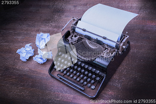 Image of Vintage typewriter and old books