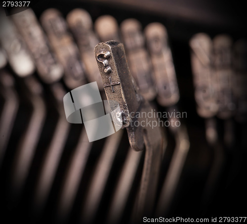 Image of Close-up of an old retro typewriter with paper