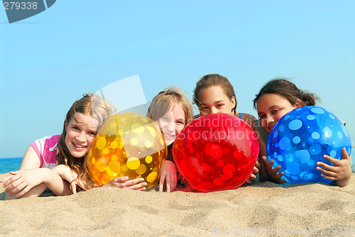 Image of Four girls on a beach