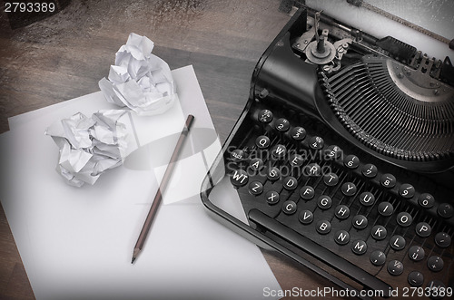 Image of Close-up of an old typewriter with paper