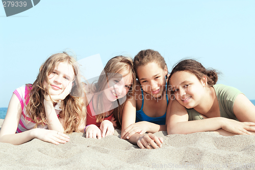 Image of Four girls on a beach