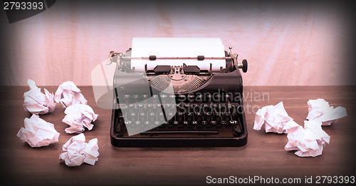 Image of Vintage typewriter and old books