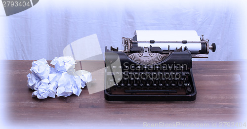 Image of Vintage typewriter and old books