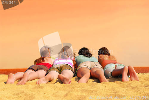 Image of Four girls at orange sea