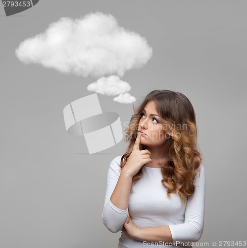Image of Thinking woman and empty cloud