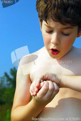 Image of Boy and frog