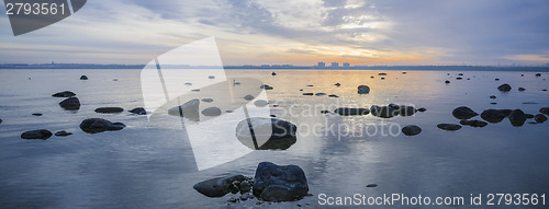 Image of Beautiful sunrise on the sea. Views of Tallinn.