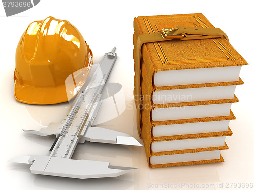Image of Vernier caliper, leather books and yellow hard hat 