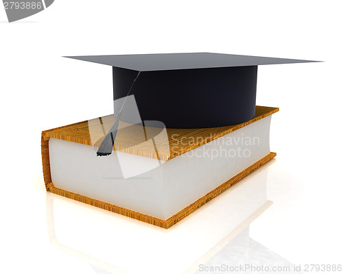 Image of Graduation hat on a leather book