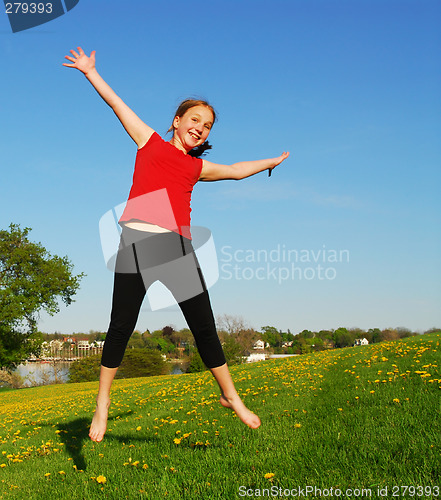 Image of Young girl jumping