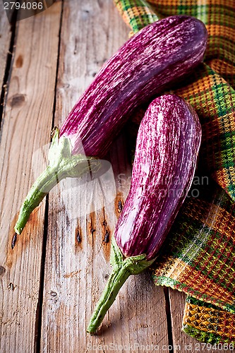 Image of two fresh eggplants