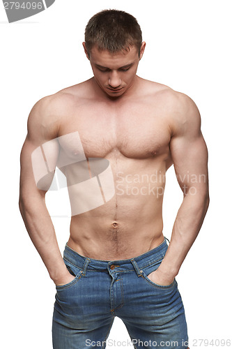 Image of Muscle man posing in studio