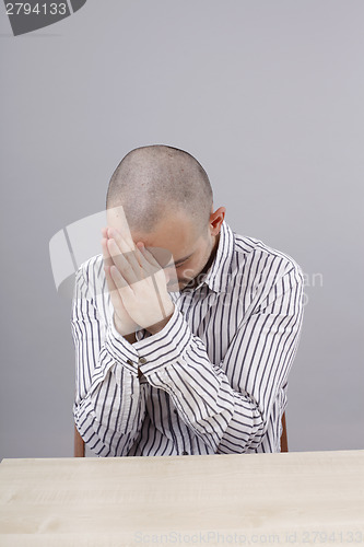 Image of Man at desk