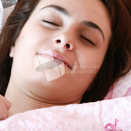 Image of Beautiful young woman sleeping.