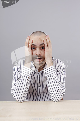 Image of Man at desk