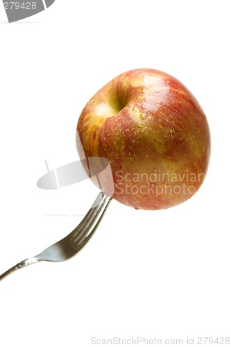 Image of Apple on fork