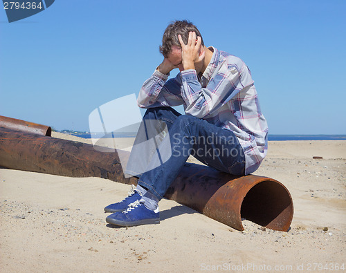 Image of Lonely young man suffering from depression