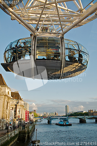 Image of London Eye in London city and Thames river