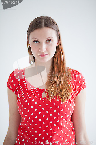 Image of Portrait of thoughtful attractive woman