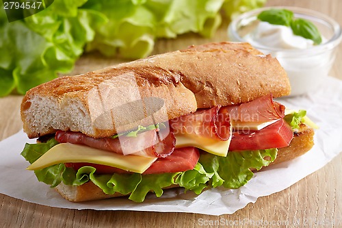 Image of Sandwich with meat and vegetables