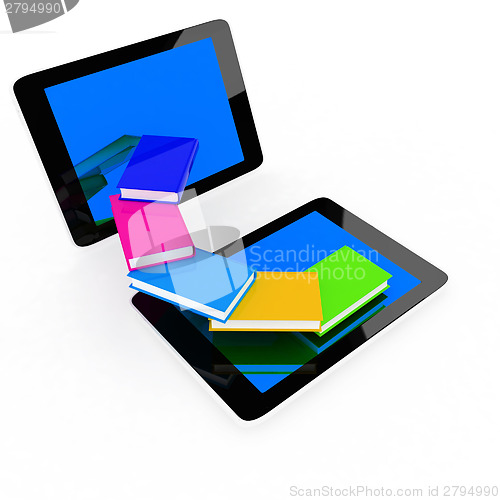 Image of tablet pc and colorful real books