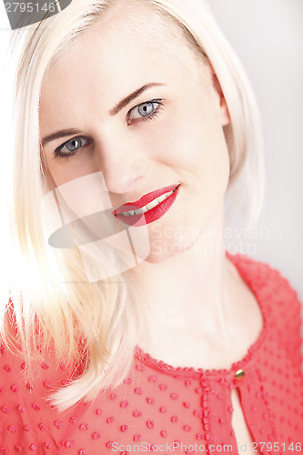 Image of Young woman with red lips