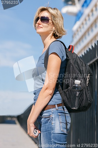 Image of Woman tourist with backpack