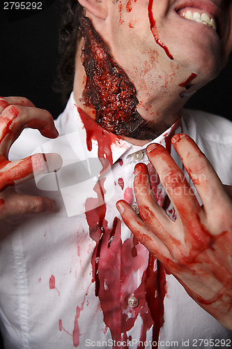 Image of Psychopath with bloody fingers