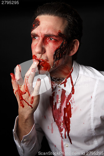 Image of Psychopath with bloody fingers