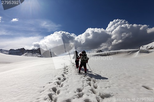 Image of Two hikers on snowy plateau