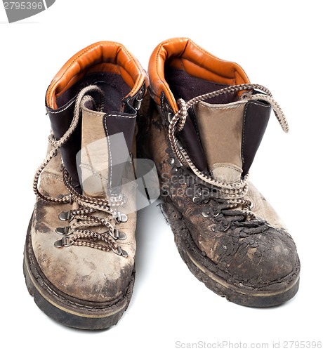 Image of Pair of old dirty trekking boots