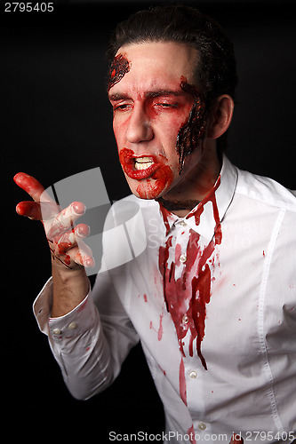 Image of Psychopath with bloody fingers
