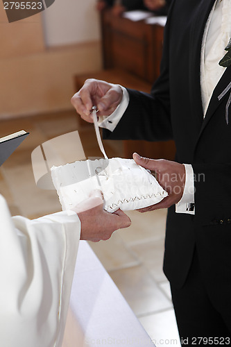 Image of Hands of a bride and groom