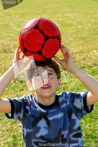 Image of Boy with soccer ball